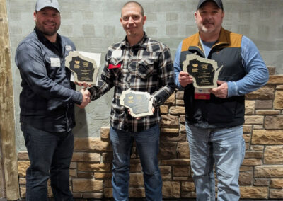 The team is accepting their awards for the Trillium Hill Farm project.